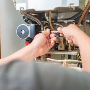 Mark's Heating & Cooling technician at work